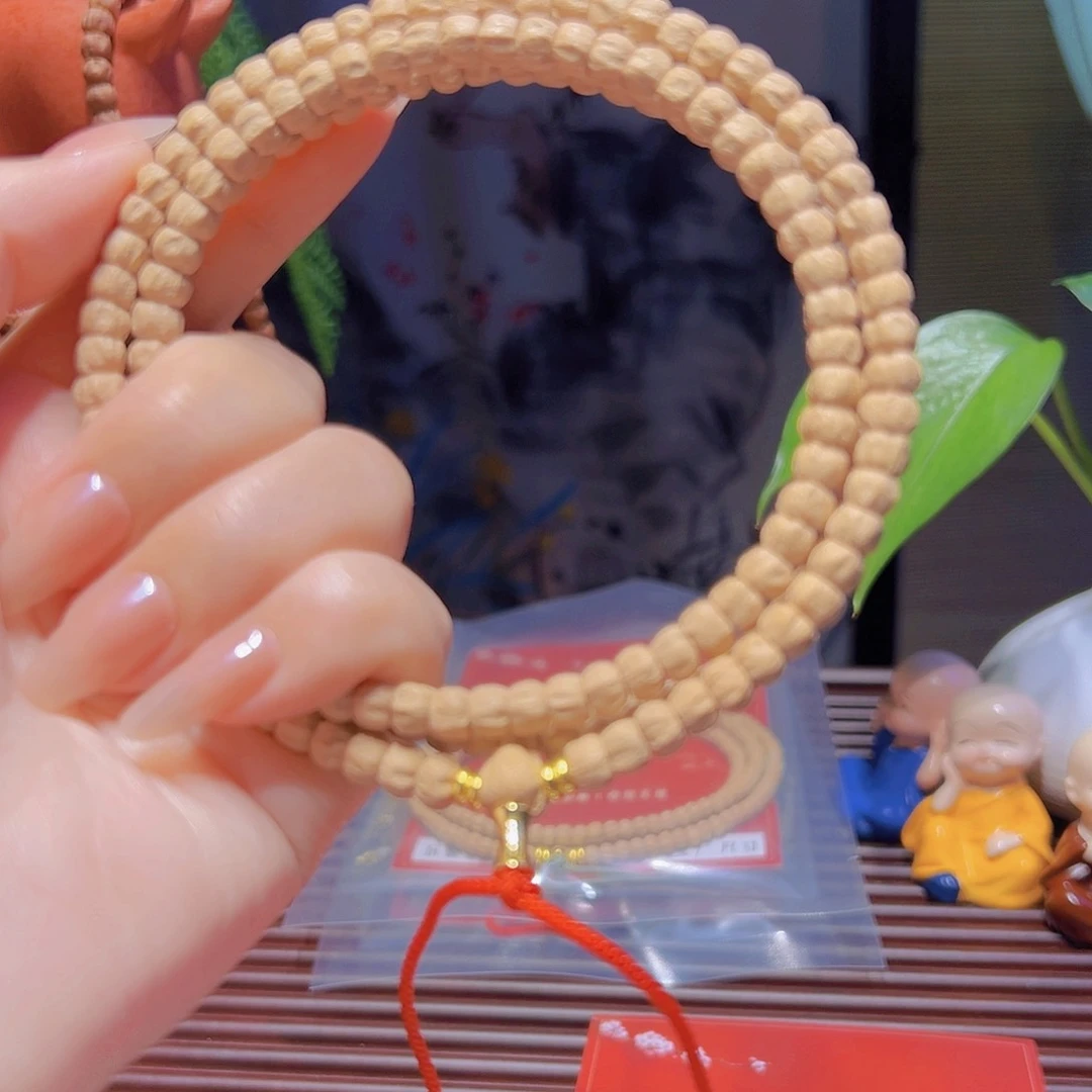 柏香籽/百香籽吊坠哈****店