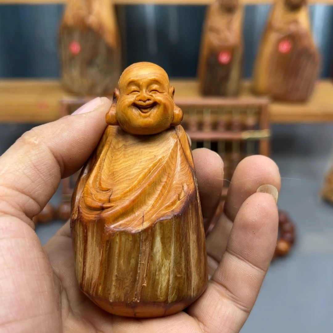 曾***经木崖柏木摆件手把件