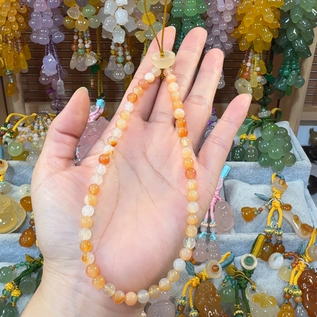 坤***坤玛瑙/玉髓未镶嵌手机挂件