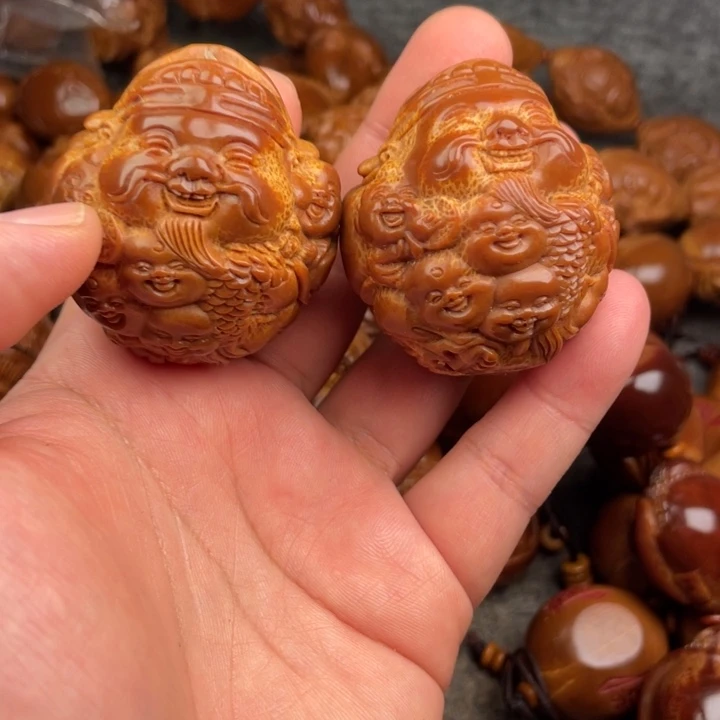 帅***孩橄榄核吊坠橄榄核