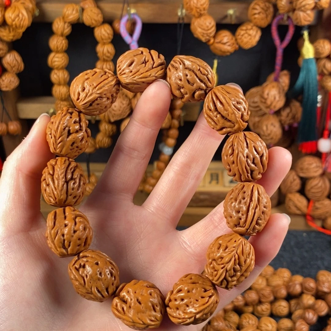 吊坠桃核桃枭手串