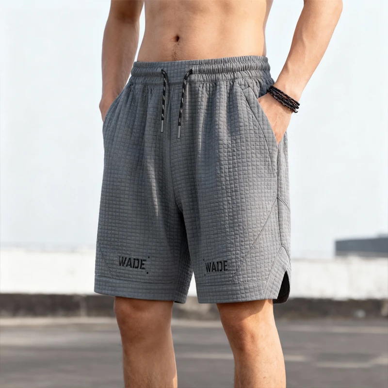 李宁卫裤夏男韦德系列时尚简约透气宽松针织运动短裤AKYU349-B品