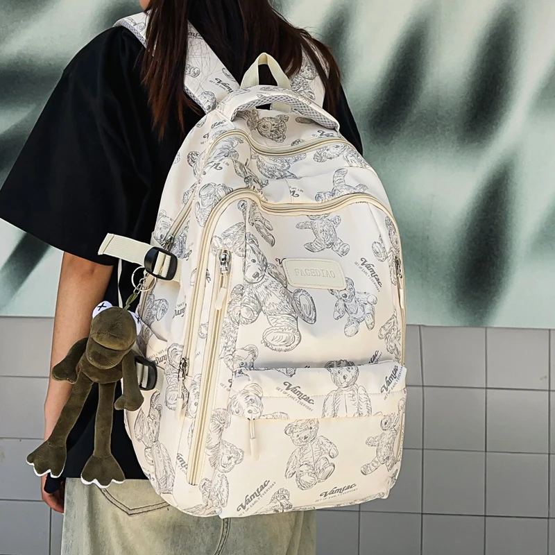书包初中高中学生背包小学生大学生旅行大容量女印花双肩包男百搭