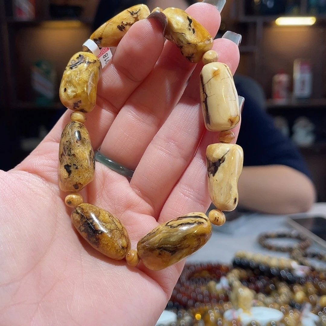 五***哥琥珀未镶嵌手链干白