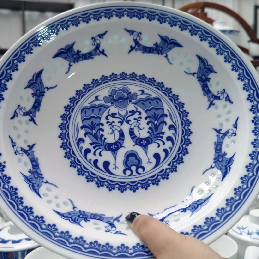 陶瓷孔雀10寸窝盘一个