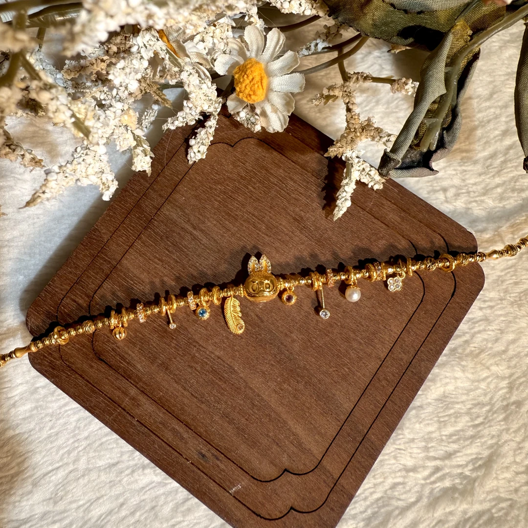 18k金重金版滴流设计款拉布布手链