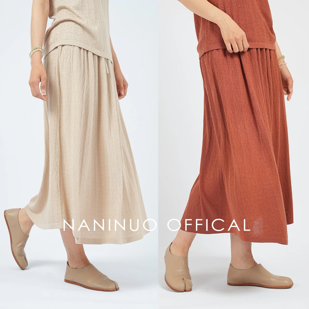 Naninuo/纳尼诺<雅>丝羊绒肌理纹收褶A字半身裙NXQZ24060
