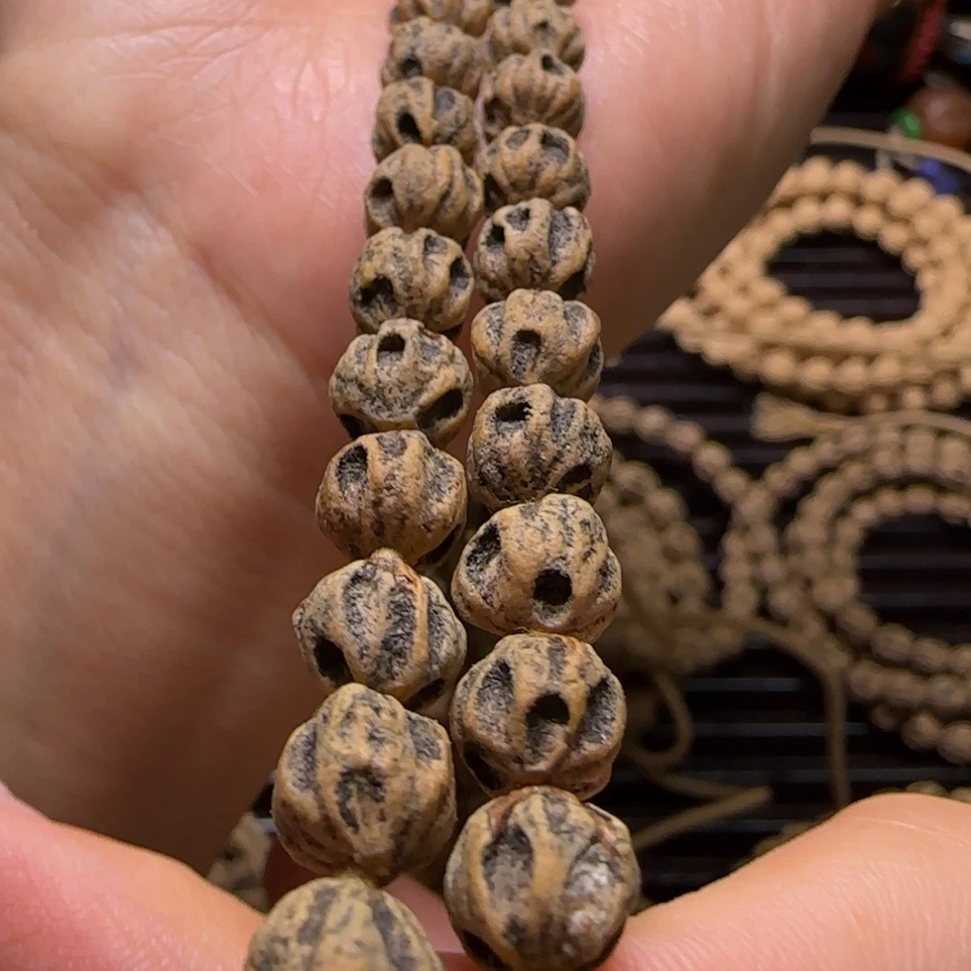 谁***仗柏香籽/百香籽吊坠