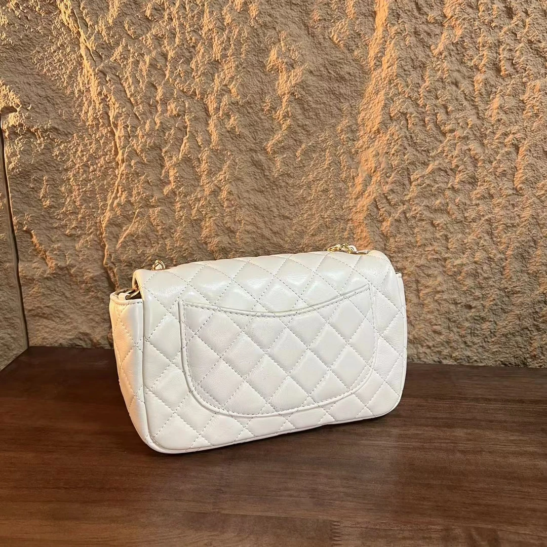 YNPO24年秋冬新款真皮重工金球方胖白色