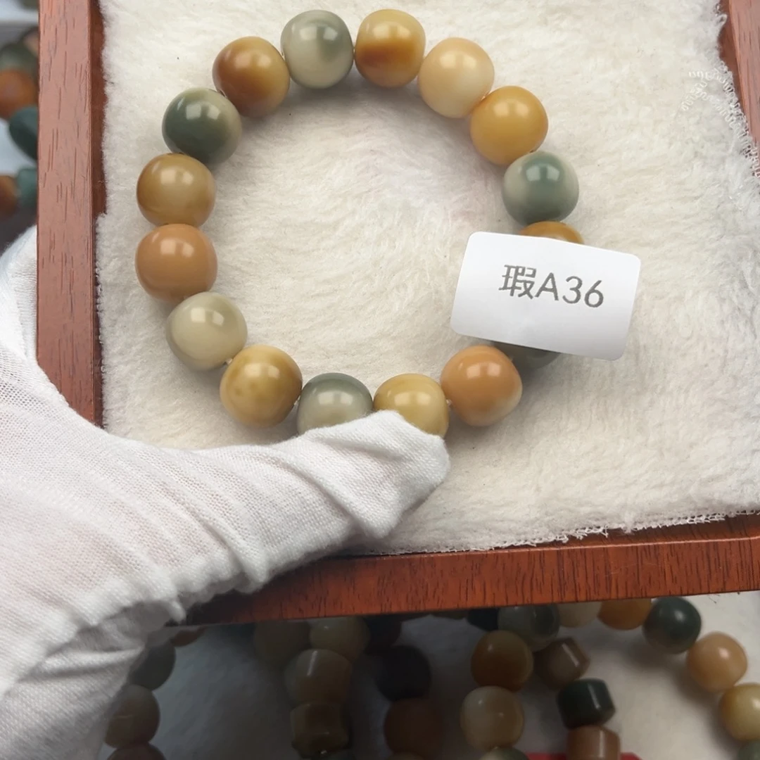 菩提根/象牙果吊坠l***y瑕A36苹果12mm一串