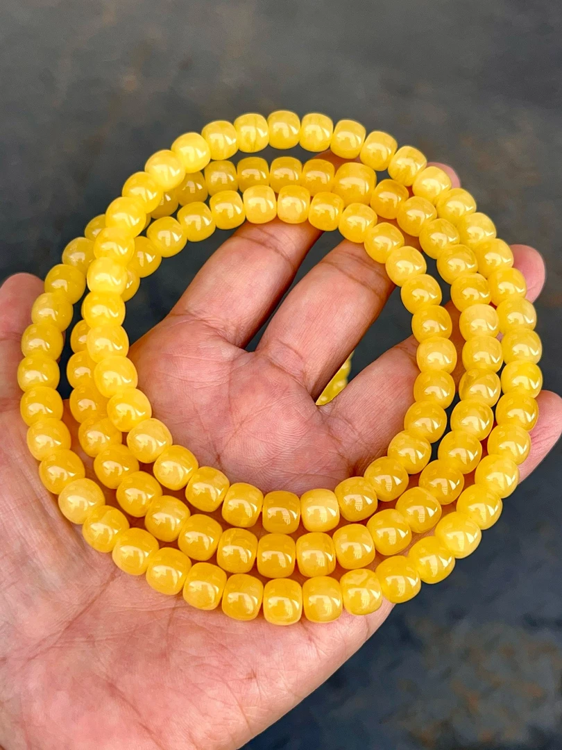 8+俄料蜜糖红精工老形佛珠