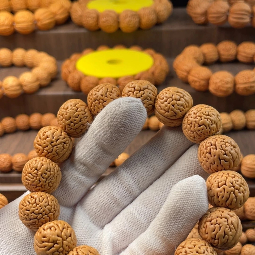 爱***.桃核吊坠盘锦肌肉