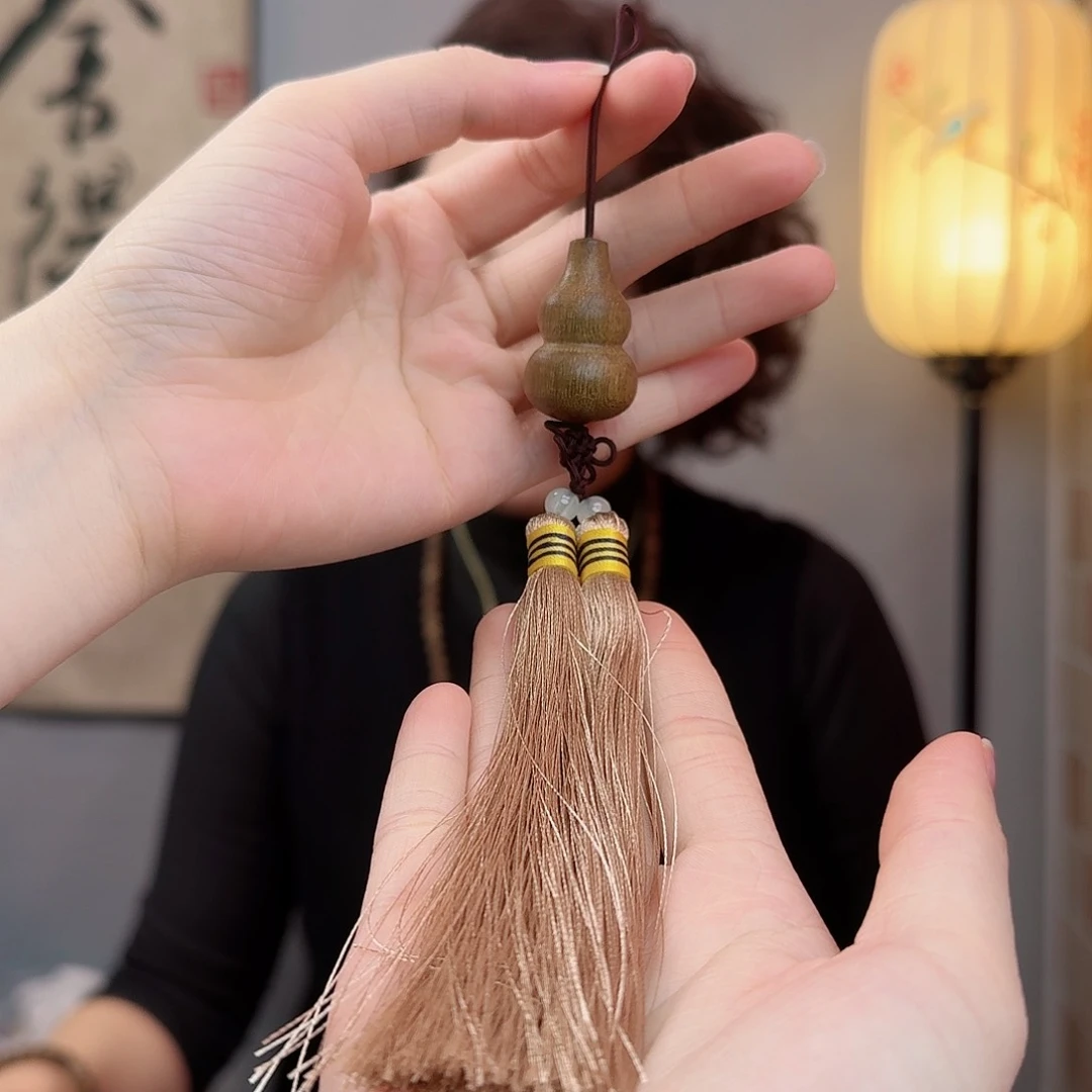 沉香吊坠海南沉香黄油格（流苏款）吊坠