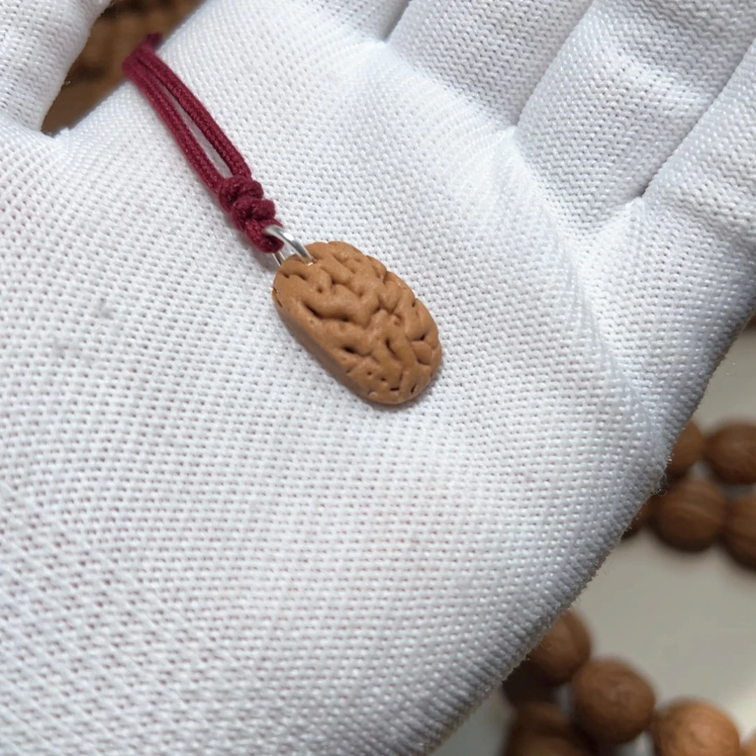 桃核吊坠泽*‘桃核桃牌