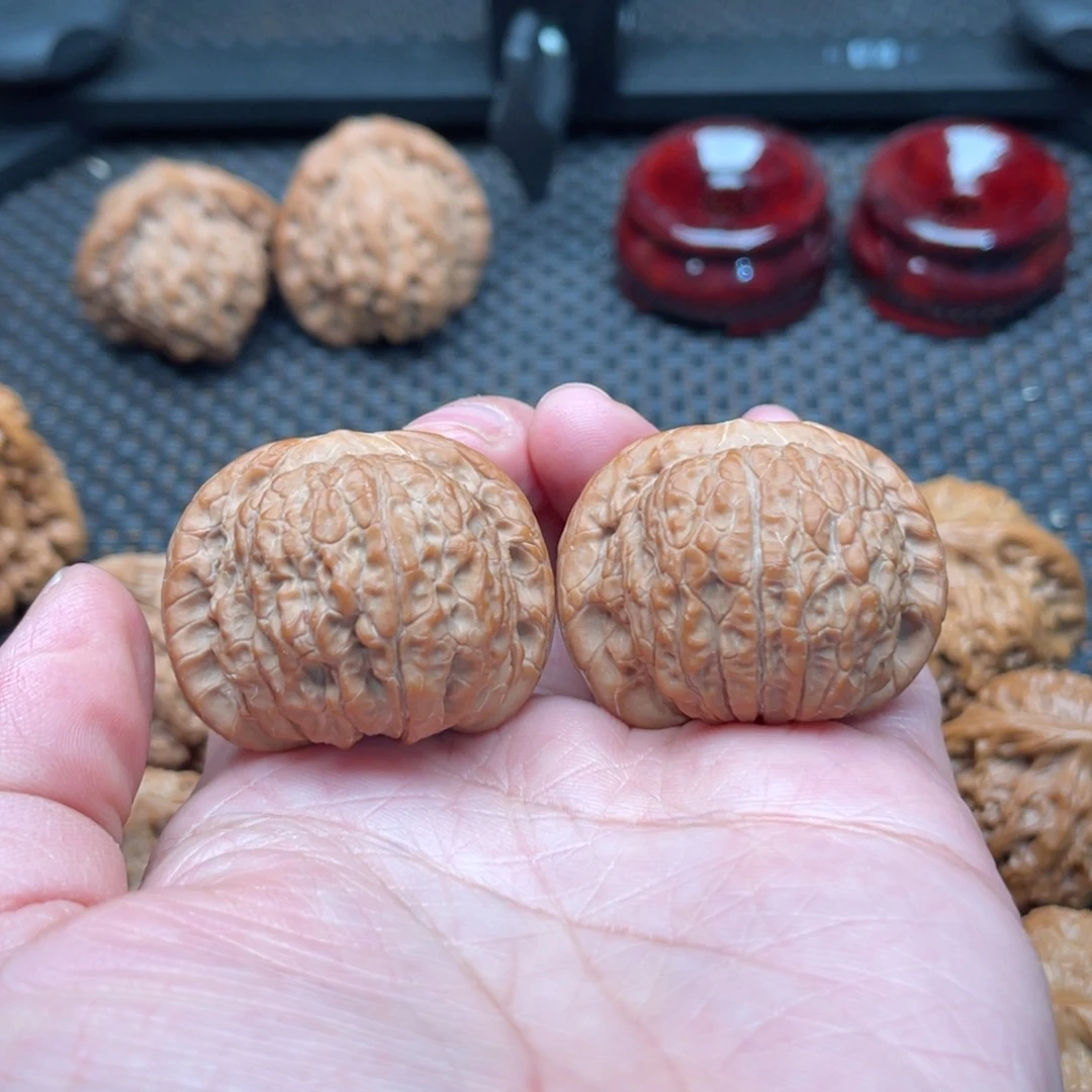 借***光文玩核桃吊坠血麒麟