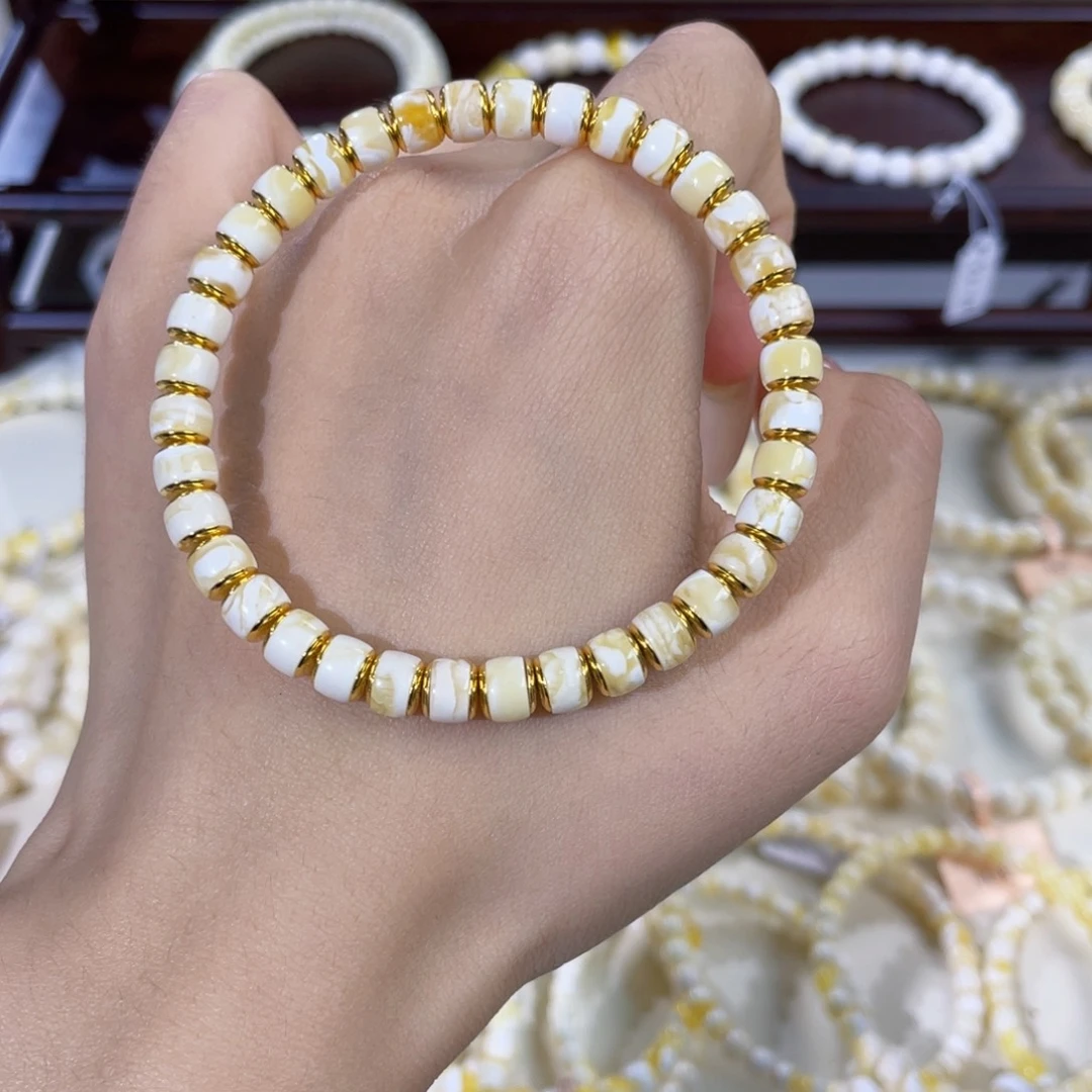 诗***华手链琥珀银S925镀金镶嵌6mm……
