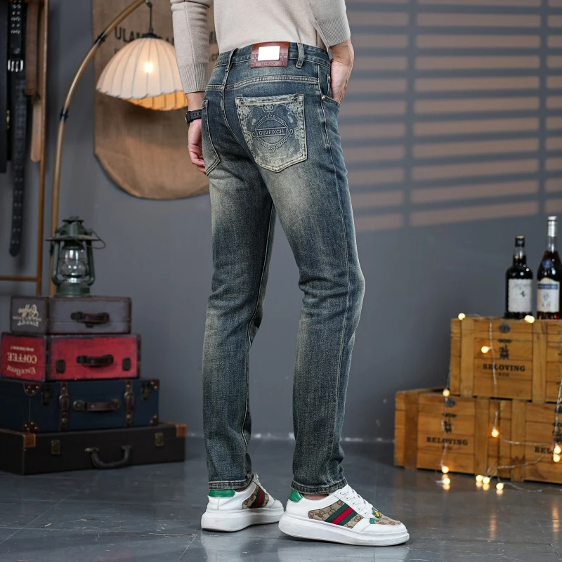 秋冬季欧货潮流欧货男士牛仔裤修身小脚弹力时尚印花复古水洗百搭