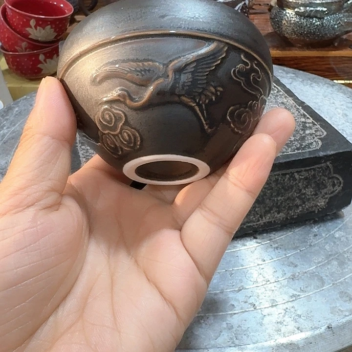 主人杯一个，瓷。。。品茗瓷