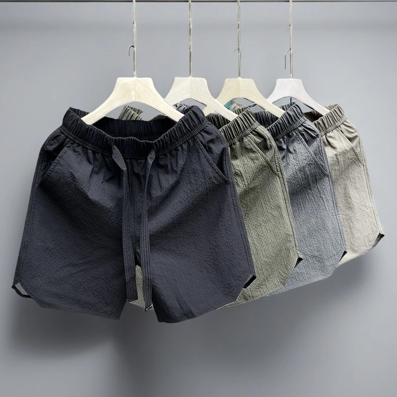 泡泡纱短裤男款夏季潮牌外穿五分美式速干沙滩裤宽松个性工装夏天