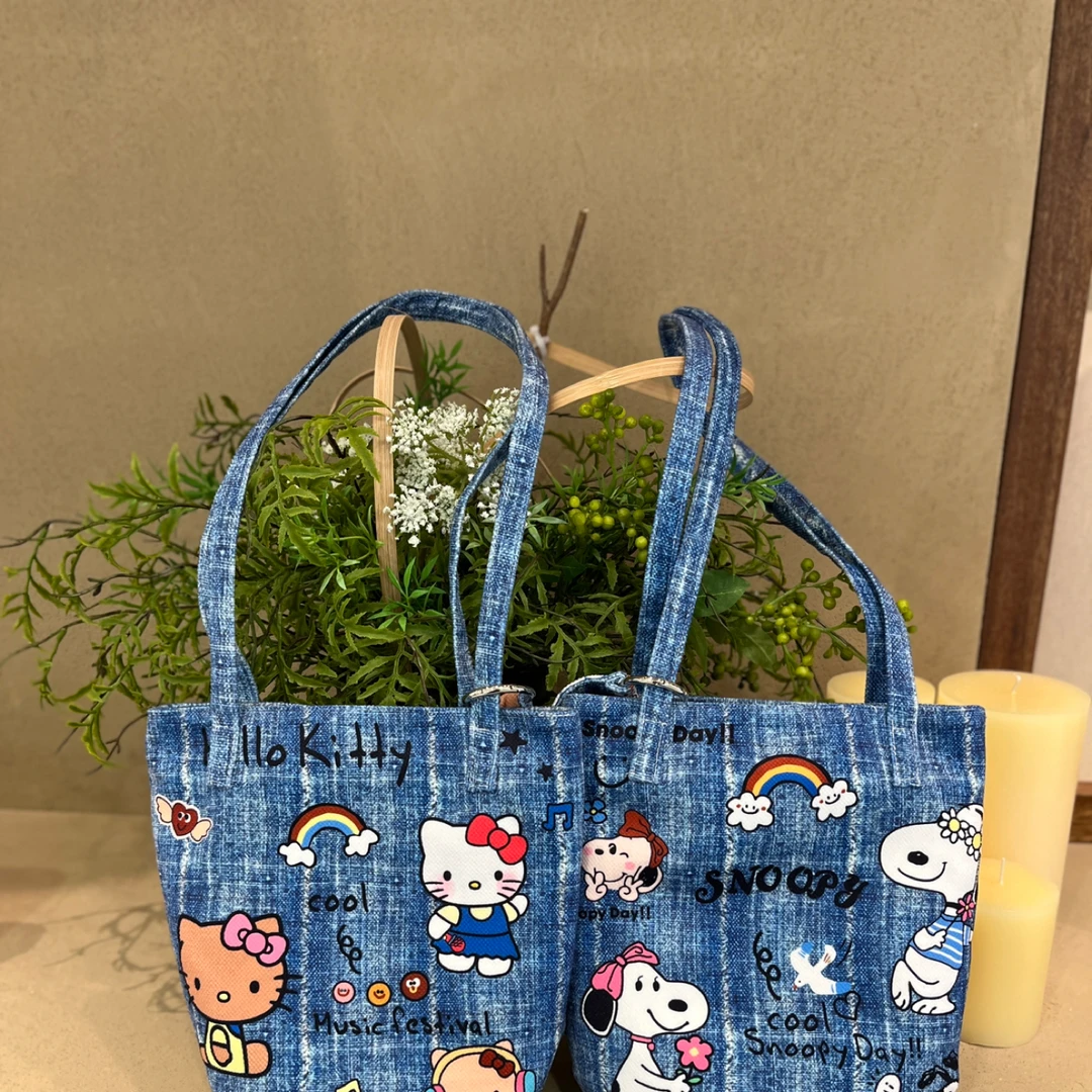 牛仔凯蒂可爱插画细肩带水桶包可斜挎大容量学生党礼物包大帆布包