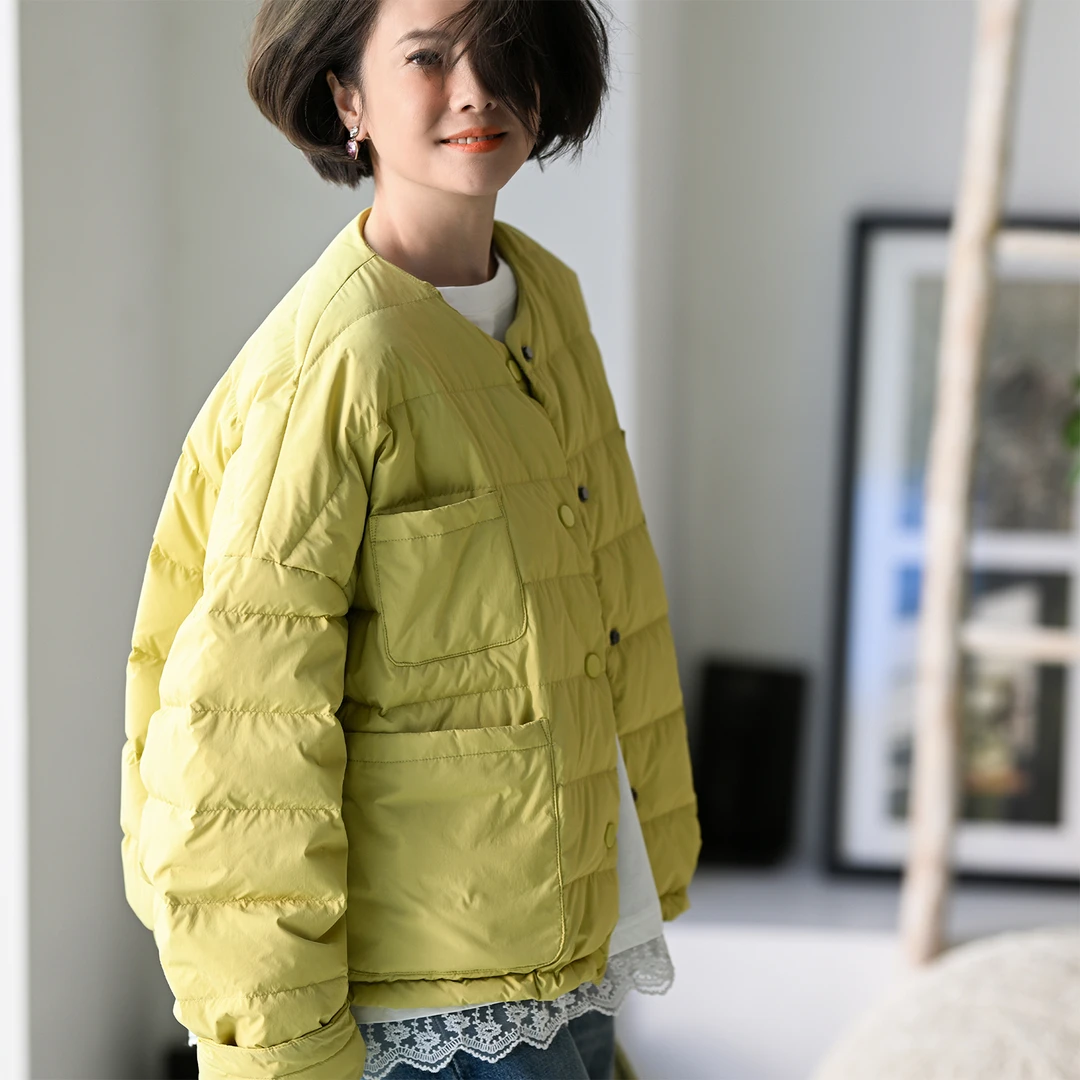 Y57808 文艺清新横格压纹多兜白鸭圆领纯色羽绒服女秋冬 米兰宣言