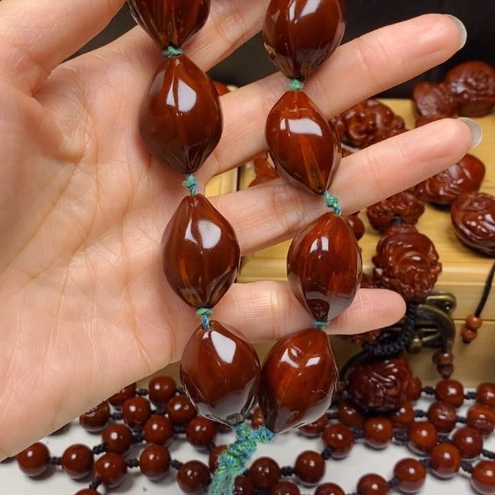 橄榄核吊坠流***风橄榄核手串