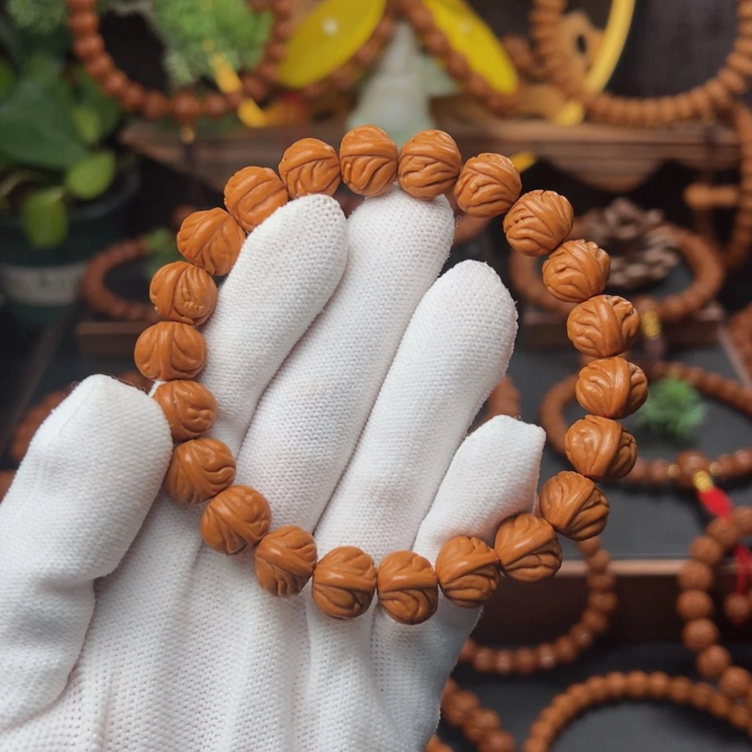 吊坠桃核1.2顶货金玉龙手串