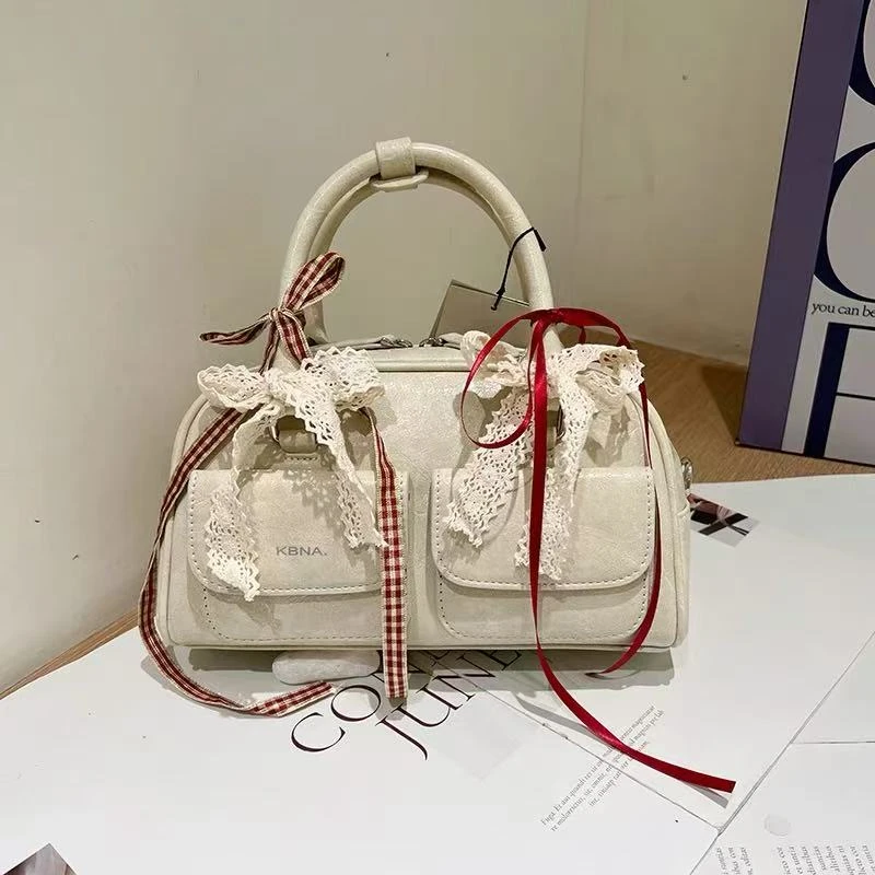 允真同款韩系丝带蝴蝶结保龄球包