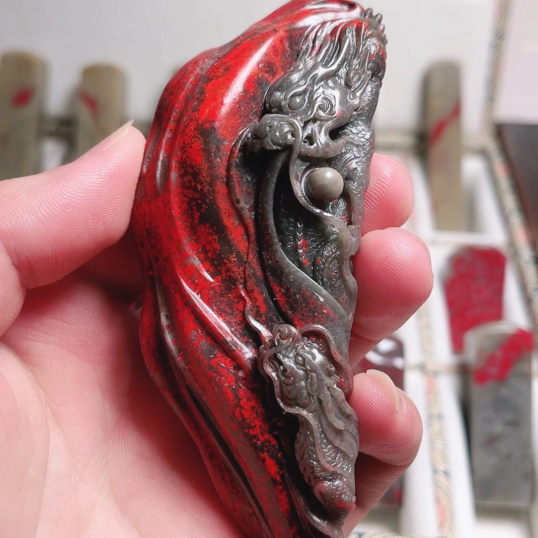 印石昌化石大红袍牛角冻龙手把件