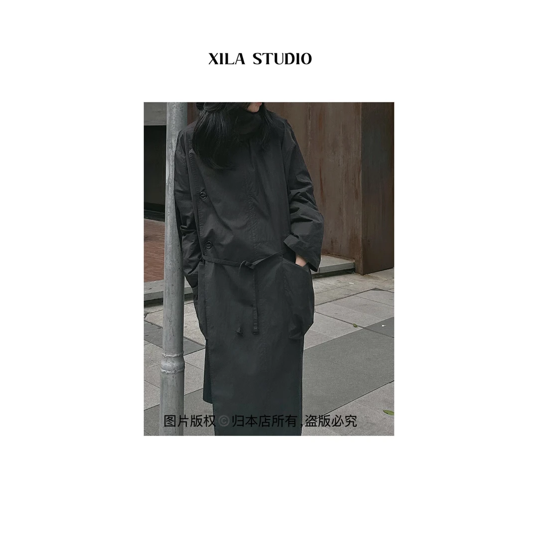 【XILA】游牧风不对称设计棉质大口袋长款风衣