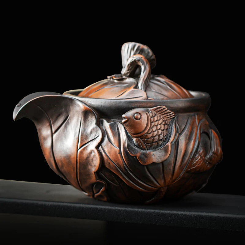 云南紫陶手抓壶纯手工雕刻泡茶壶创意浮雕防烫功夫茶具可养高档否