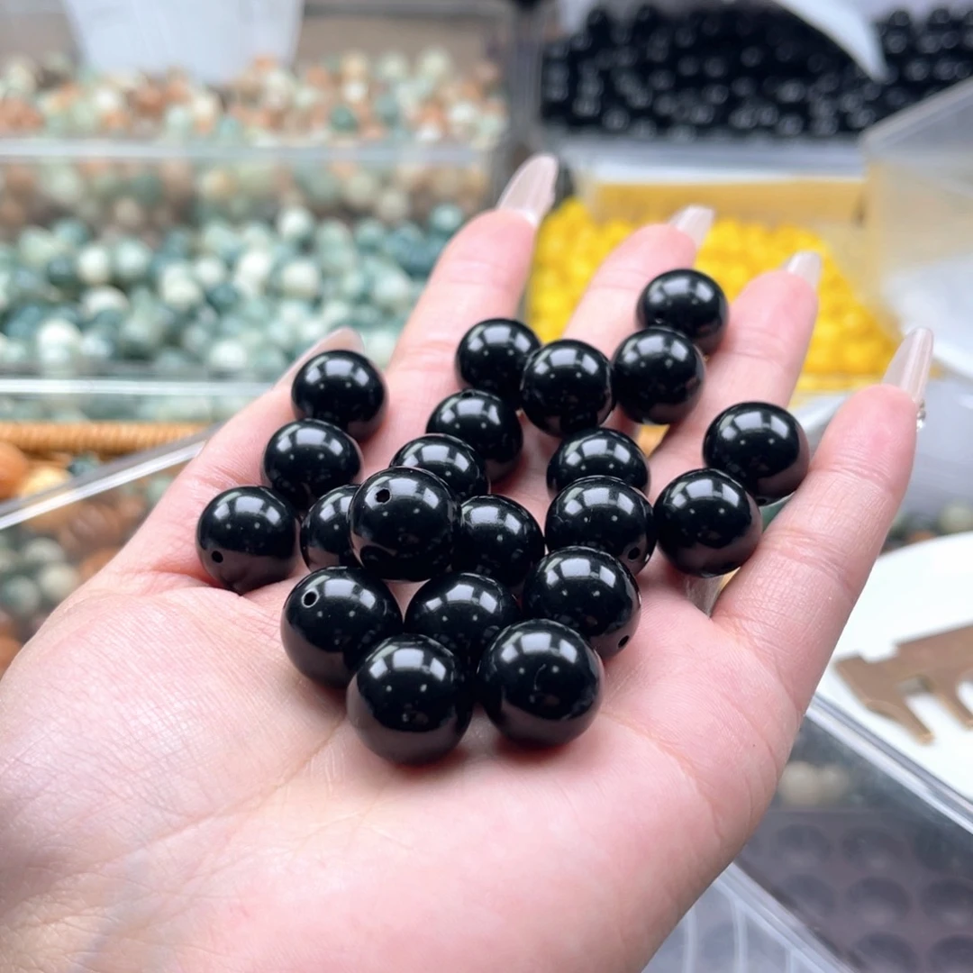 白玉菩提吊坠c14.75mm50+10颗。海南黑金巨无霸