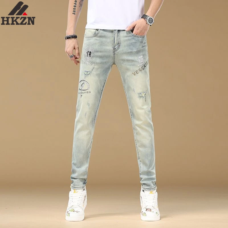 HKZN印花烫钻牛仔裤男弹力修身小脚男生破洞长裤春秋季新款男士