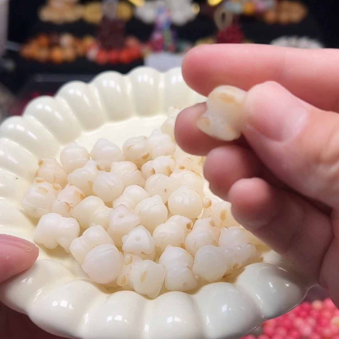 菩提根/象牙果手串20颗瑕炭烧小熊有裂