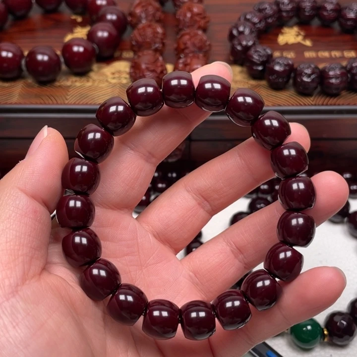 峰***橄榄核吊坠猴头手串