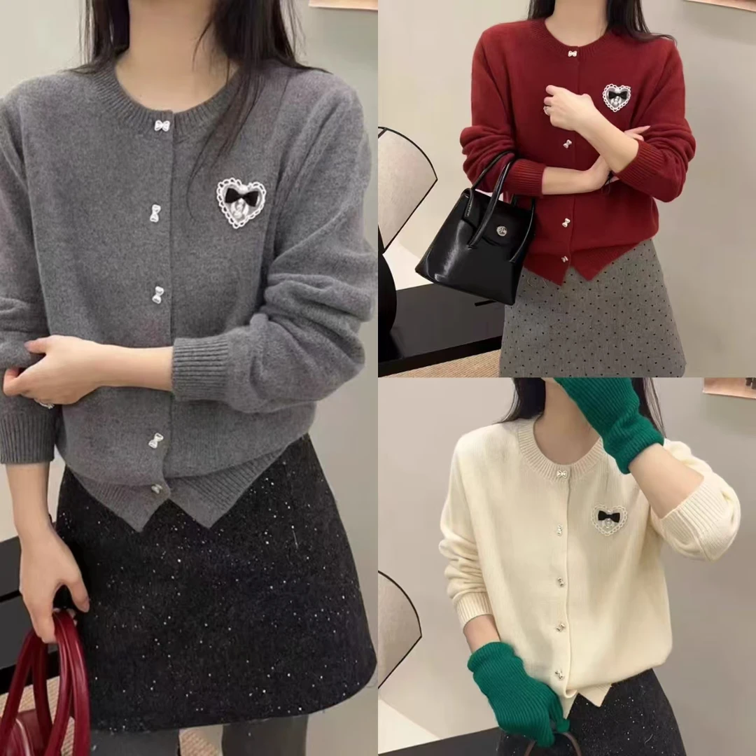 紫哥ZIGE欧韩精致蝴蝶结扣毛衣LL#2101