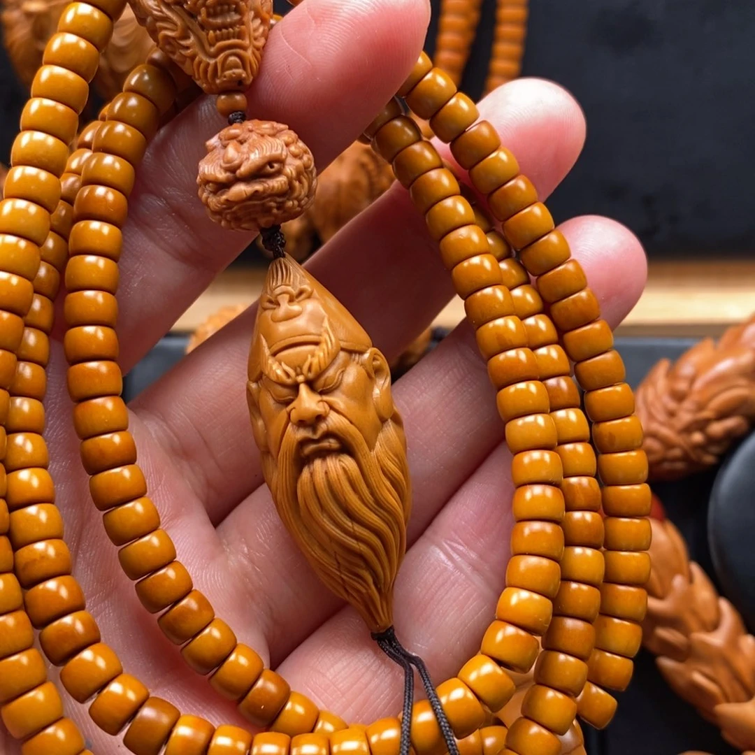 橄榄核手串咯*哒关公脖挂