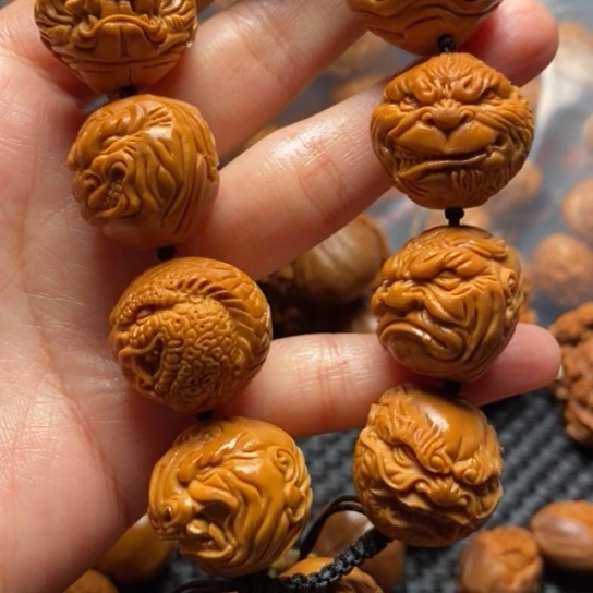 橄榄核吊坠心**明生肖恶僧