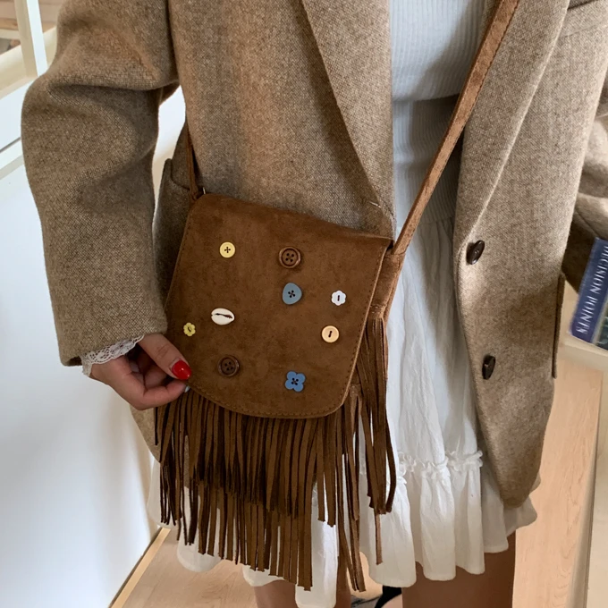 美拉德风包包女复古时尚纽扣小众设计感单肩包斜挎西部流苏包