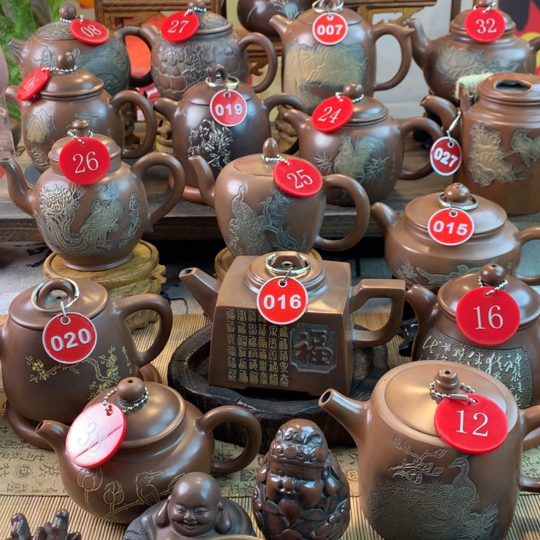 与**乐坭兴陶手工书法壶