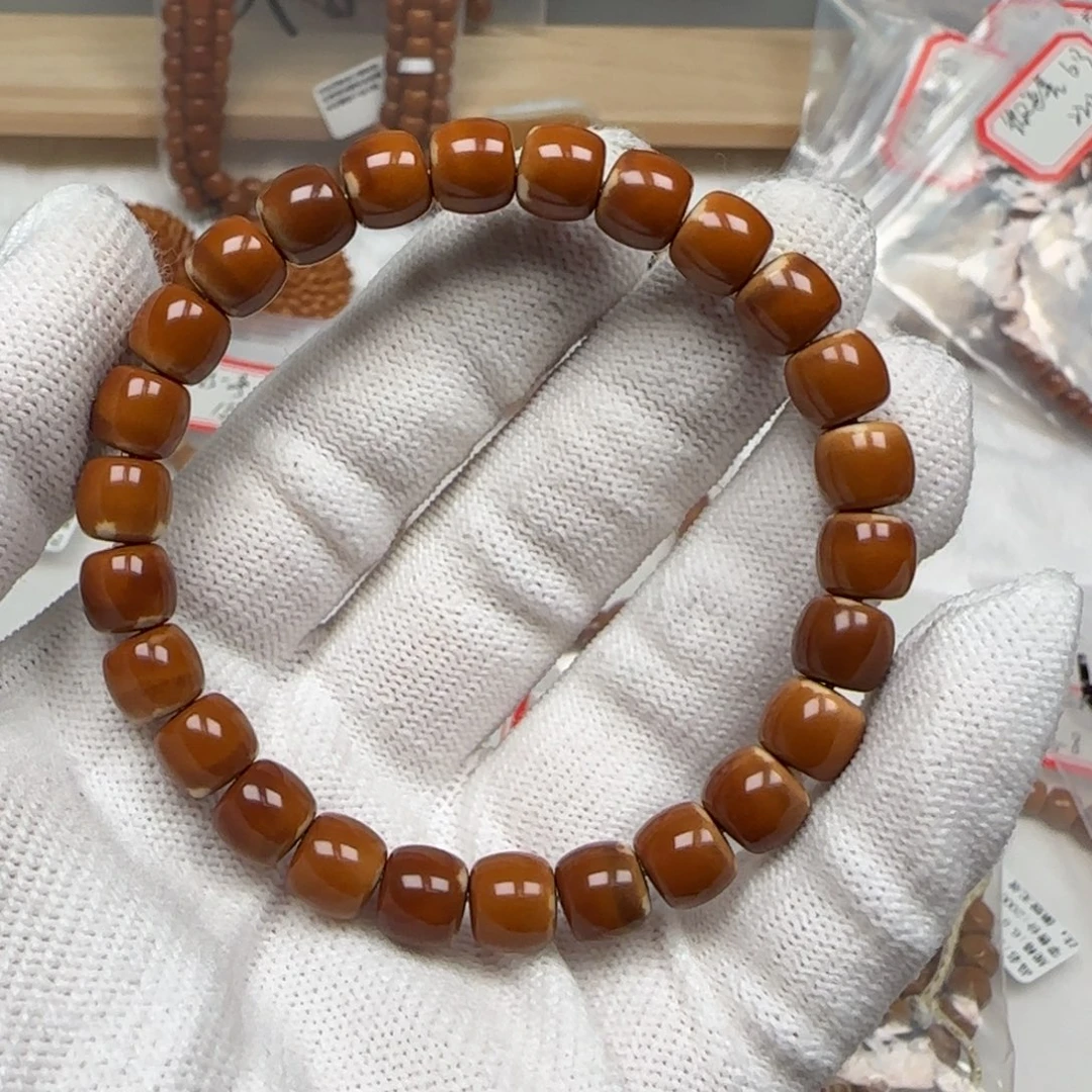 橄榄核手串老挝单圈极限弧三花反油8.4面吗