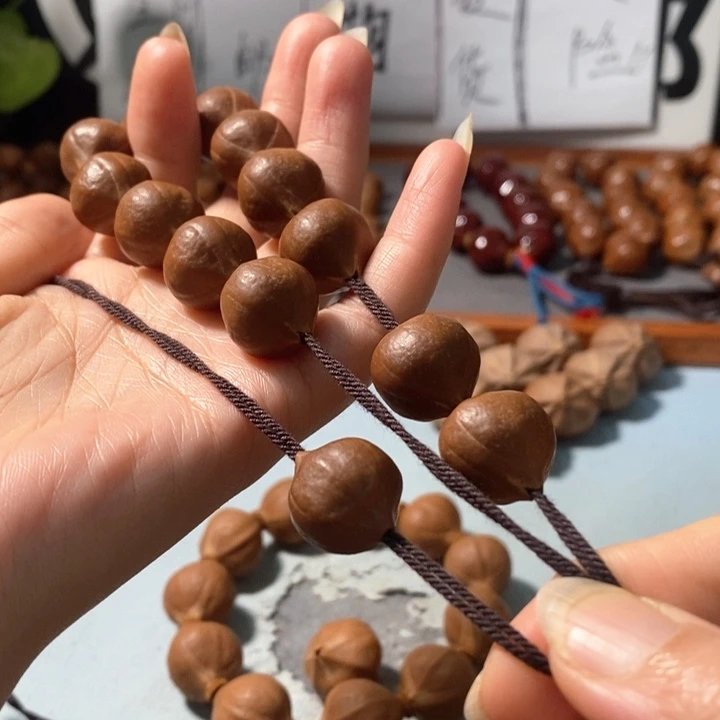 橄榄核手串16*19精品蒜头铁核鸡血红12+1颗