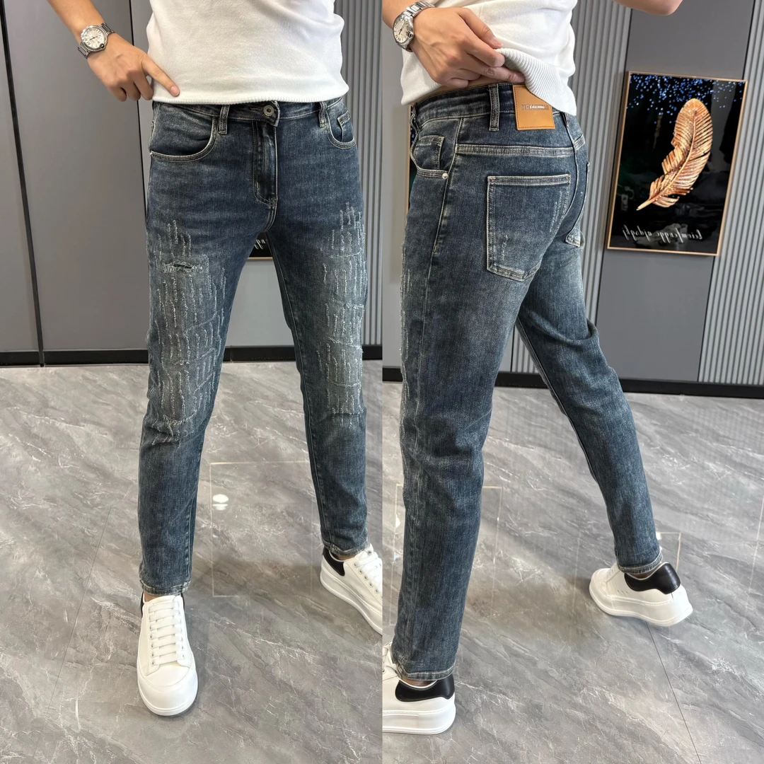男士牛仔裤冬季新款裤子男款时尚破洞修身小脚裤男士秋冬款裤子