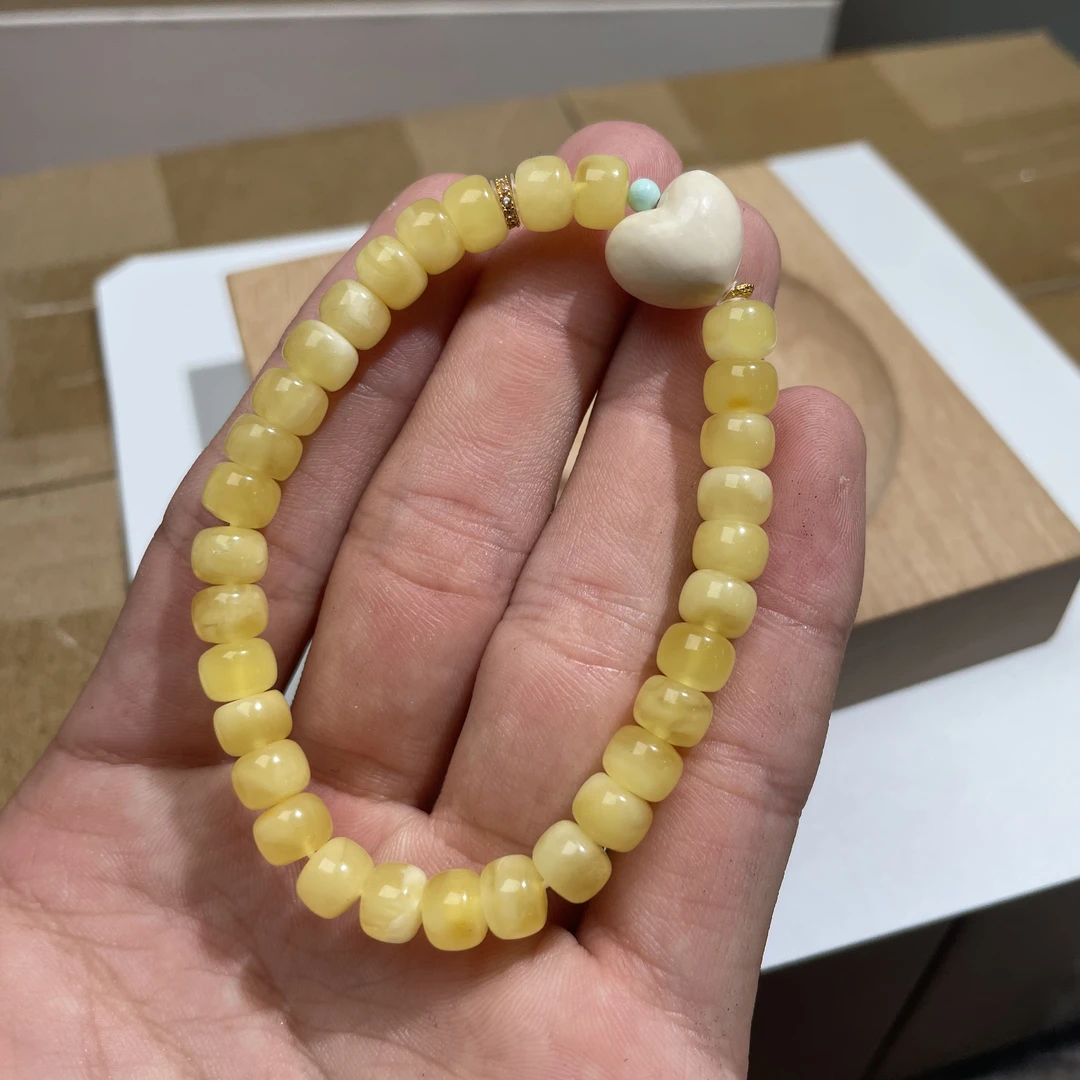 猛犸牙爱心蜜蜡老型手链 KT24110112