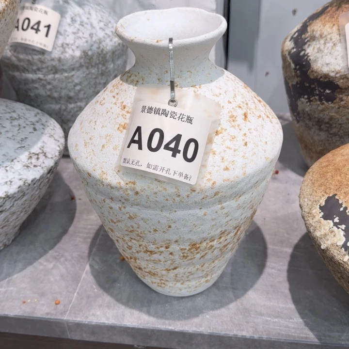 阳***琪瓷片景德镇高温花器编码040高33口6默认无孔