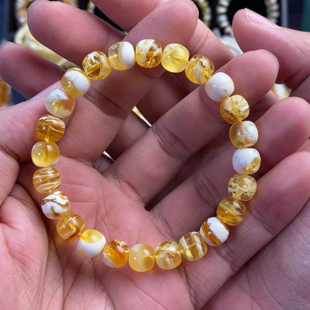 琥珀未镶嵌裸石9*8.5mm漆白拉丝纹