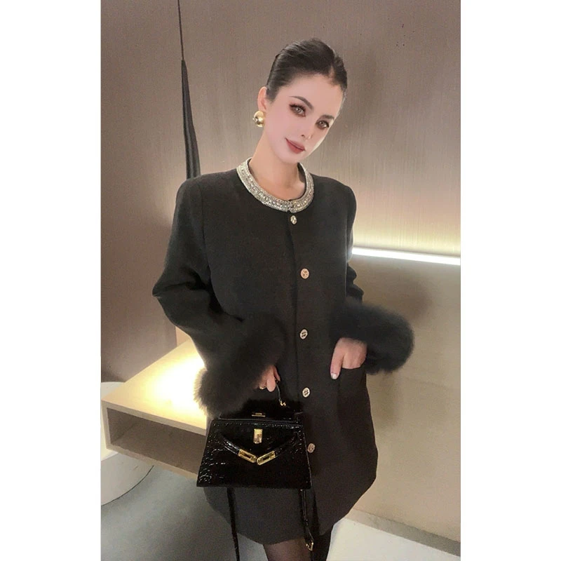 （特价）重工毛毛袖拼接羽绒服外套WT30225