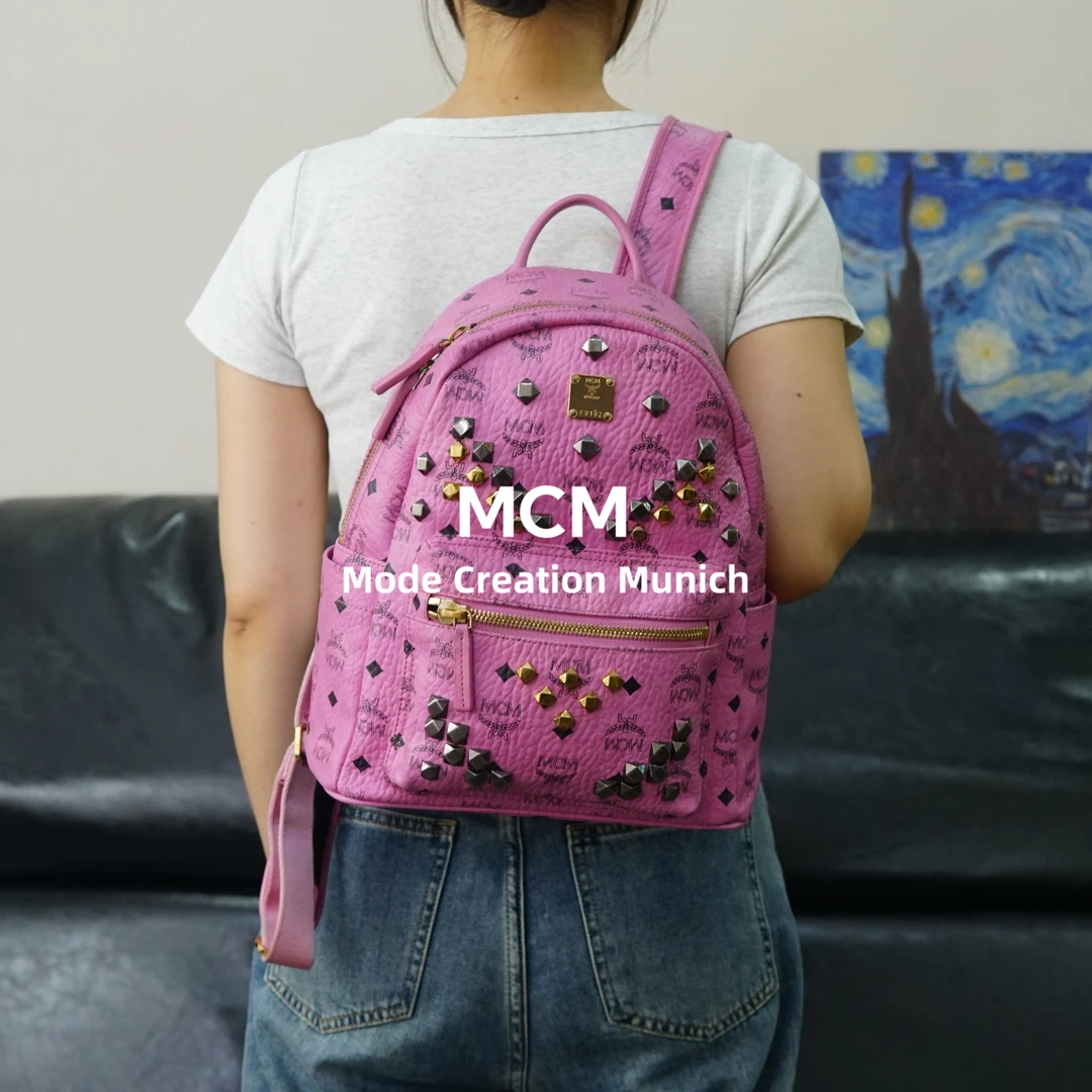 95新 MCM 粉色双肩书包/WJ05329075/9075