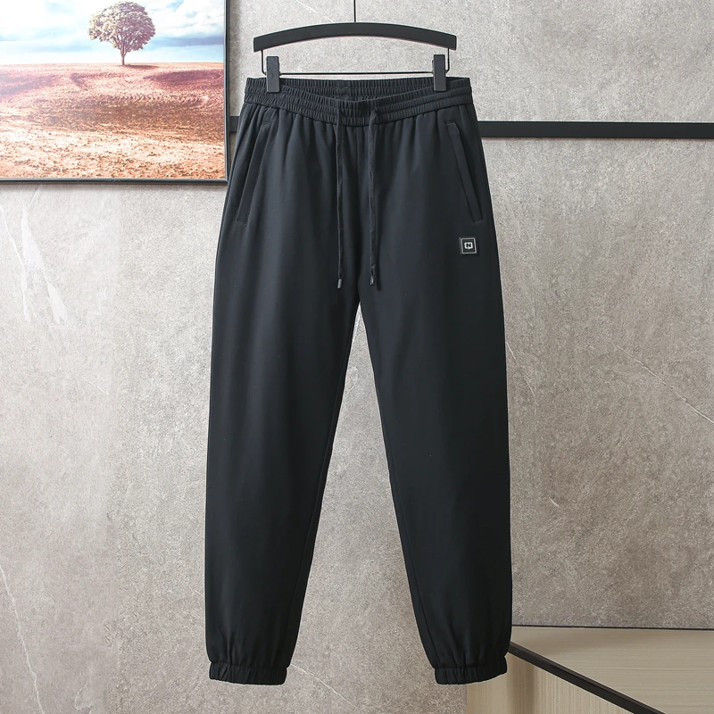 口袋带拉链  品牌撤柜男裤黑色羽绒裤男款外穿冬季保暖鸭绒束脚裤