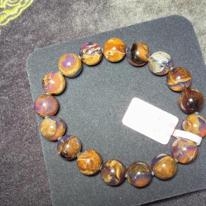 琥珀未镶嵌珠宝奇石12mm紫茶金丝溶洞